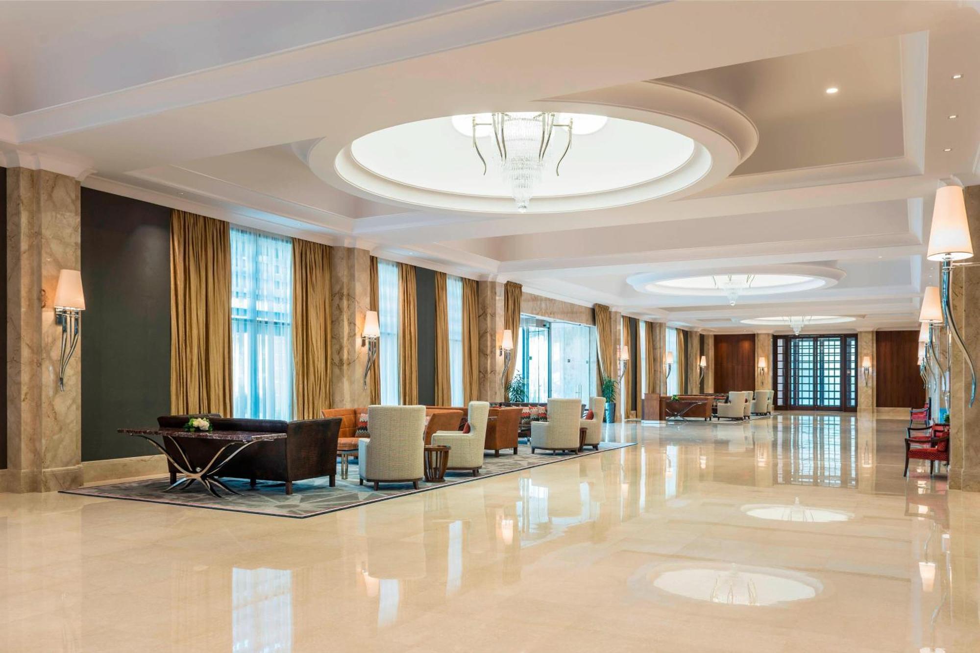 Sheraton Oman Hotel Mascate Exterior foto Lobby